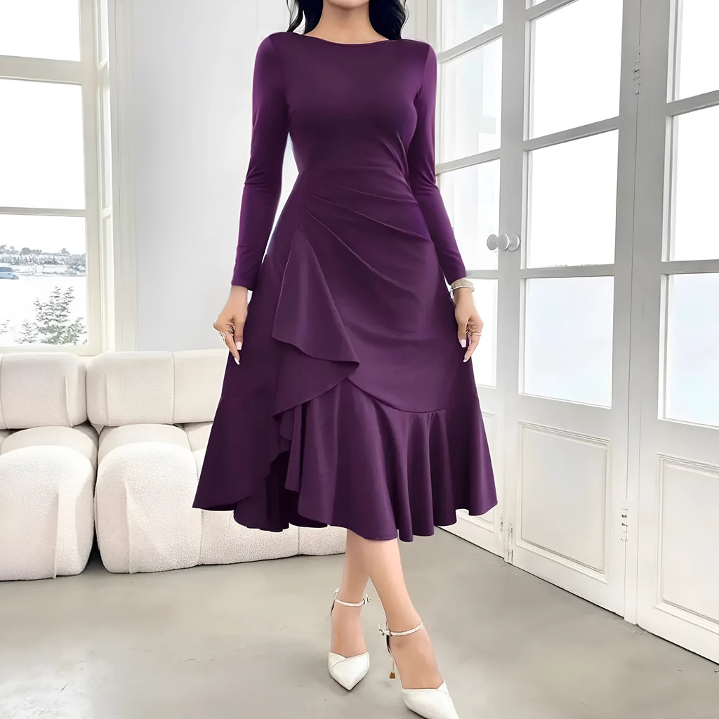 Purple women's long sleeve dress with ruffle detail and a mid waist fit.