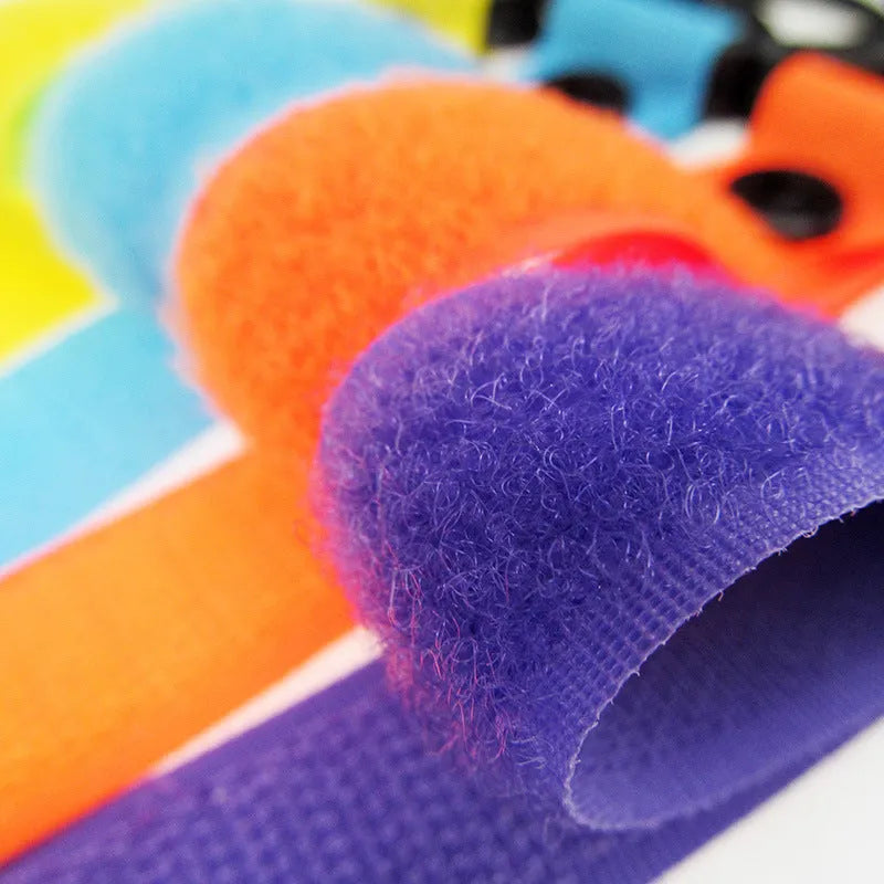 Nylon Velcro luggage hook in multiple colours on white background with OPP packaging
