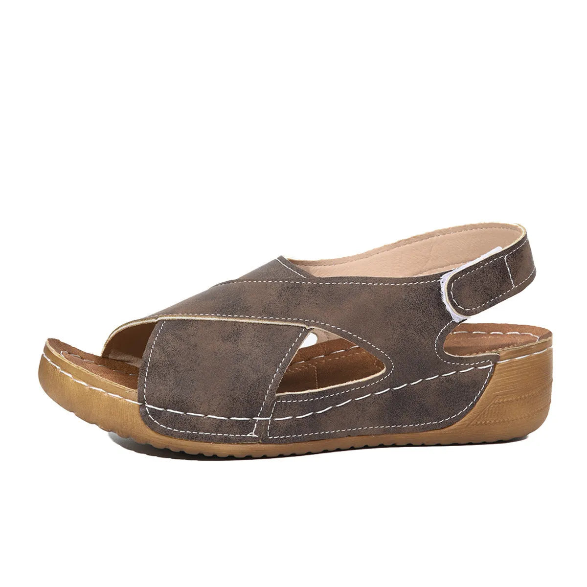 Roman platform sandals with skirt detail and adjustable Velcro strap in earthy colour options