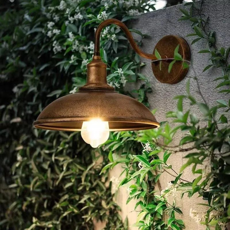 Retro-style outdoor wall light in copper finish with an oblique bevel angle design