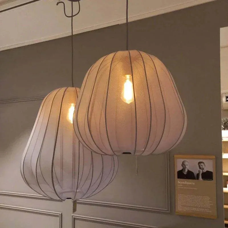 Japanese style pumpkin ceiling lamp with branch design in white finish showing LED illumination