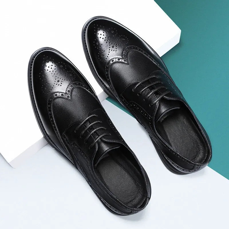Men's black and brown brogue shoes with traditional wingtip detailing for business wear