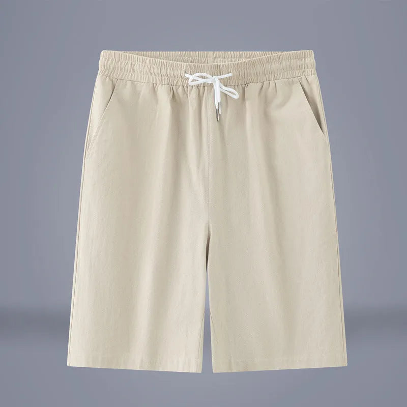 Solid colour cotton linen cropped summer pants with a drawstring waist on a hanger.