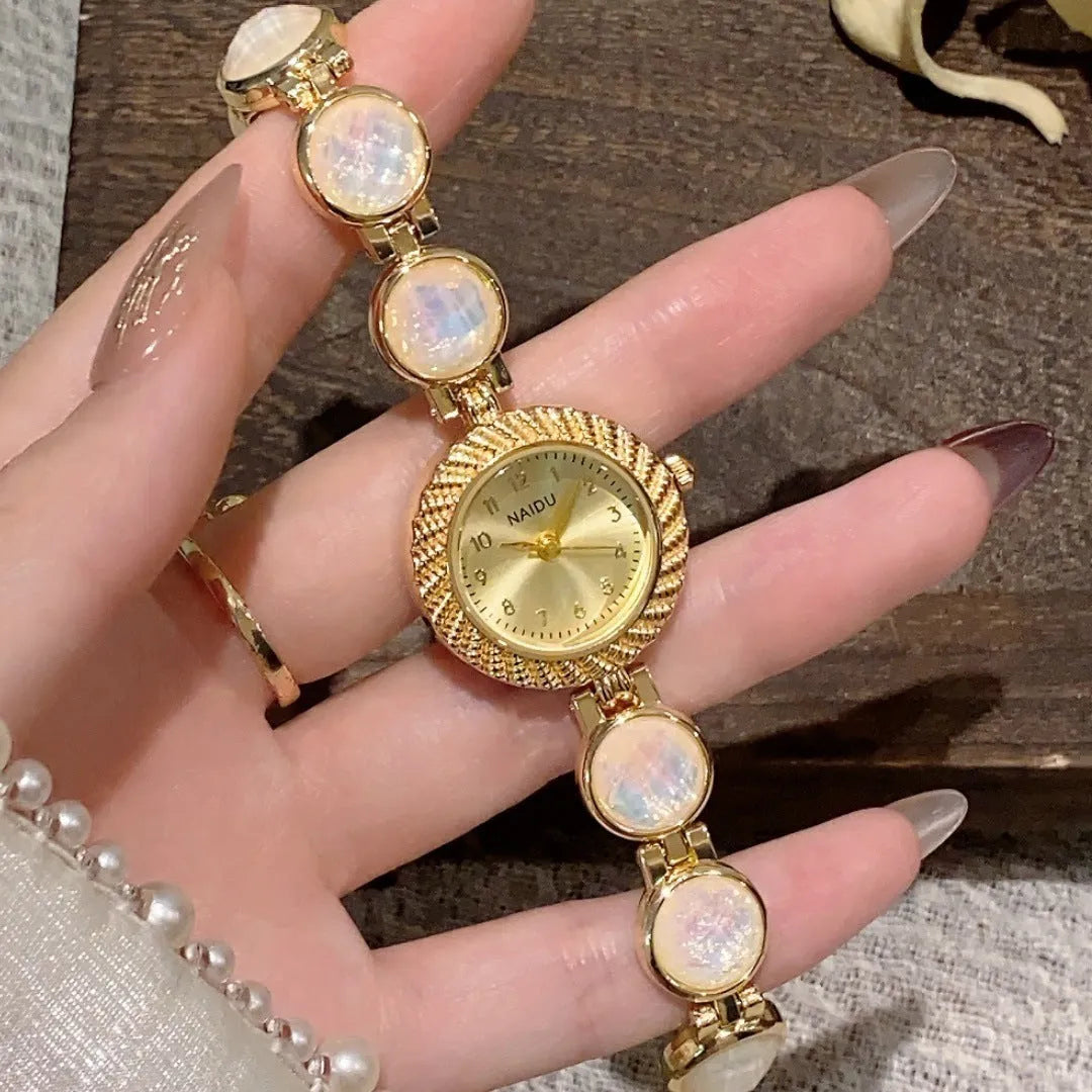 Women's quartz watch with 25mm round dial and zinc alloy case in a choice of six colours.