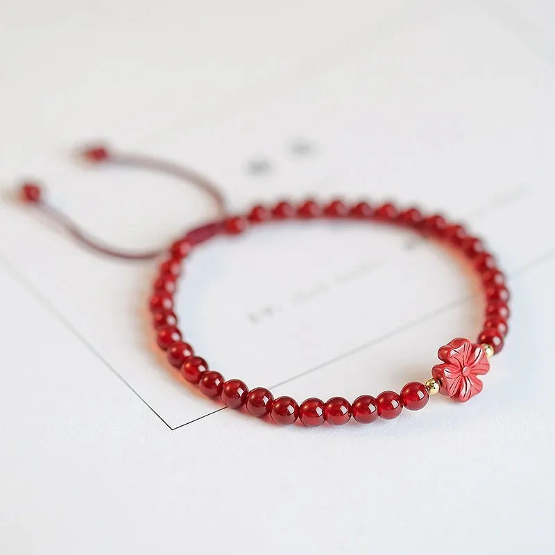 Hand-woven red agate beads bracelet with diamond-shaped arrangements in ethnic style design