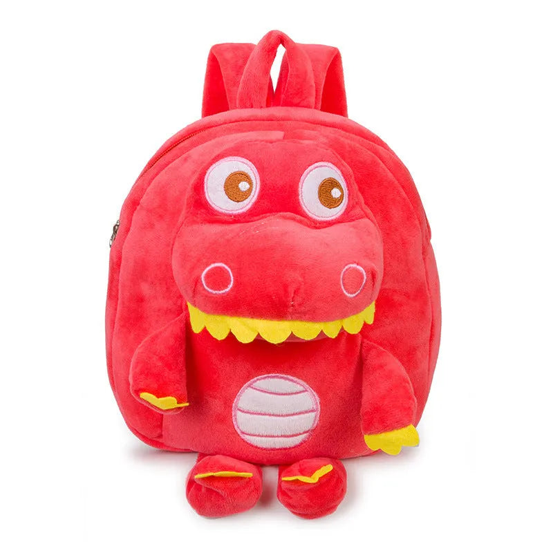 Soft blue plush dinosaur backpack for kids with embroidered character detail and a soft handle.
