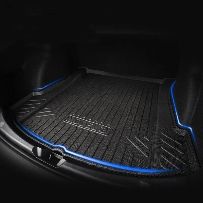 Custom rubber floor mats for Tesla cars with a textured TPE driver footrest section.