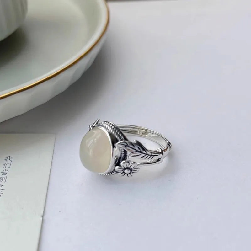 Adjustable copper vintage ring with antique finish and white chalcedony appearance