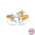 Adjustable silver-plated ring featuring a cartoon sitting corgi dog design.
