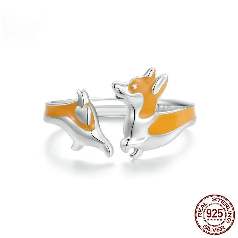 Adjustable silver-plated ring featuring a cartoon sitting corgi dog design.