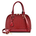 Large shiny black PU shoulder bag with crossbody strap showing interior polyester lining
