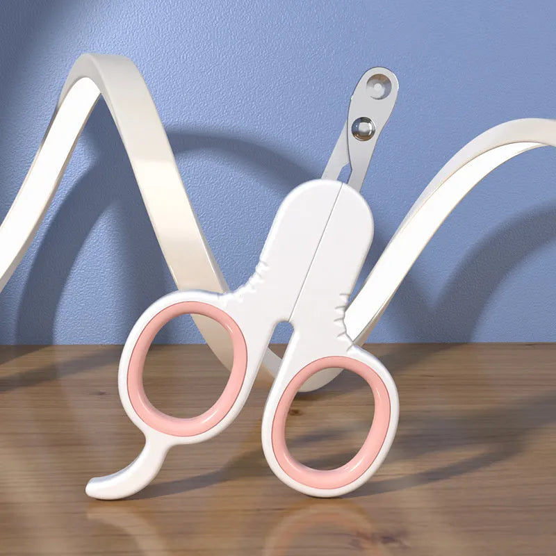 Grey and pink pet nail clippers with curved tip design for cats and small dogs
