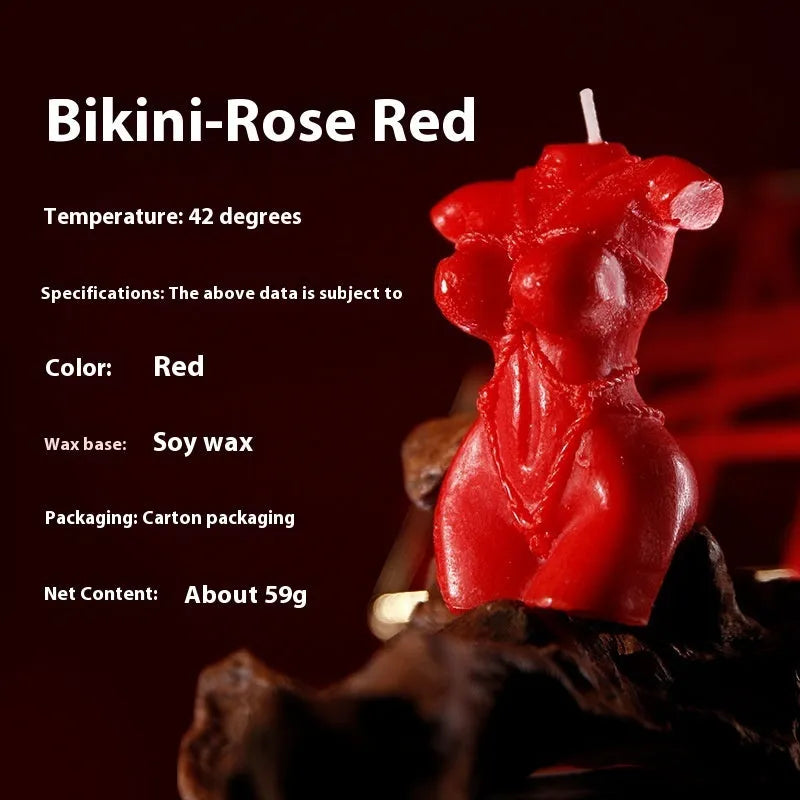 Smsexy Props soy wax bikini-shaped fragrance candle in red, pink, or purple.
