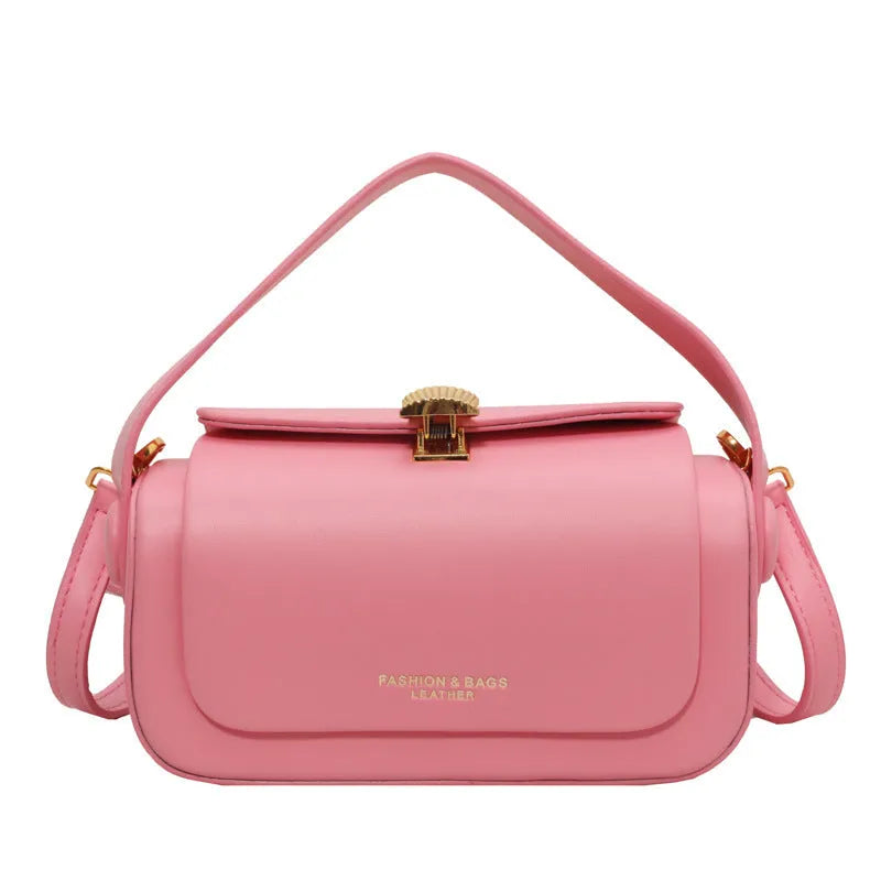 Women's personalised PU leather shoulder messenger bag in beige with letter detailing and stitching.