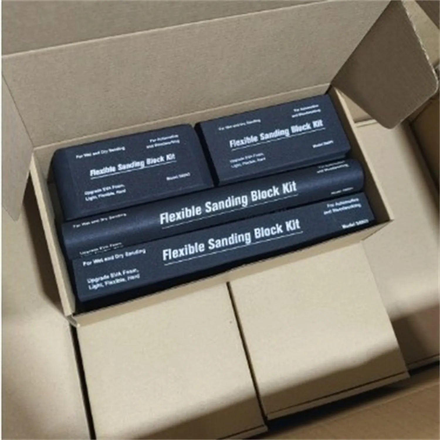Set of seven black EVA frosted blocks for metal polishing and surface texturing.