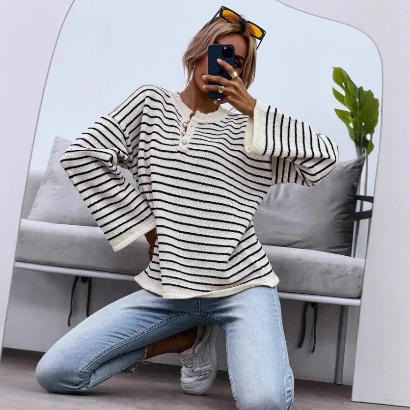Black striped women's knitted top with drop-shoulder long sleeves and button details