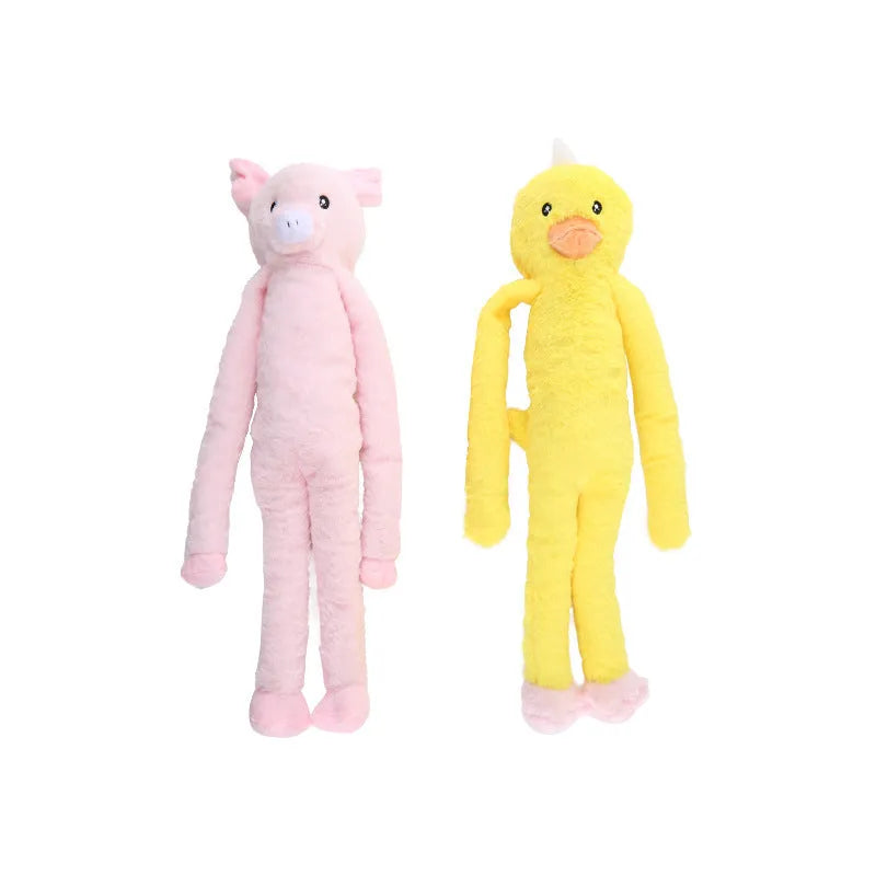Large pink and yellow plush dog toy with squeaker and crinkle sounds for golden retriever sized breeds