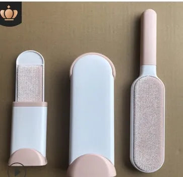 Reusable pet hair removal brush with double-sided roller and self-cleaning base