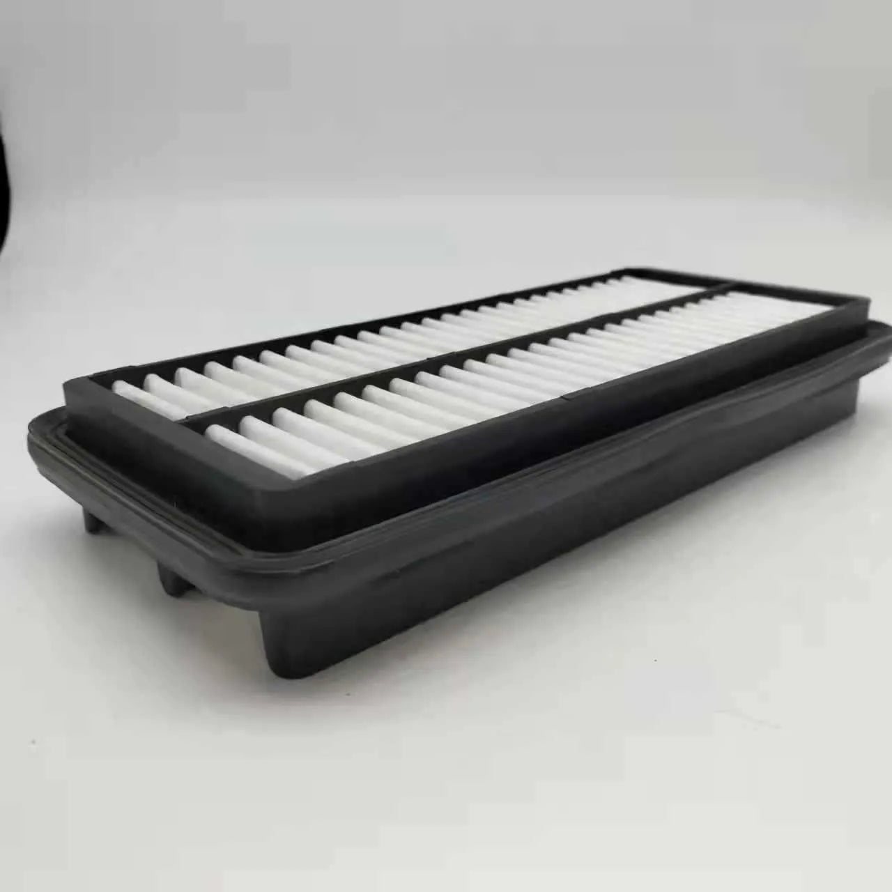 Black Hyundai car engine air filter with dimensions 256mm by 113mm by 40mm