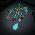 Blue turquoise water drop pendant necklace with heart-shaped gem inlay on ball bead chain