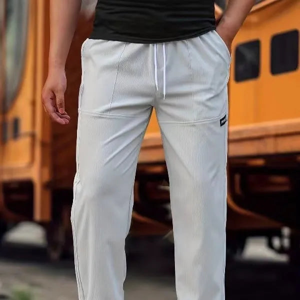 Men's polyester trousers in multiple colours including light grey, dark green, black for spring and autumn wear
