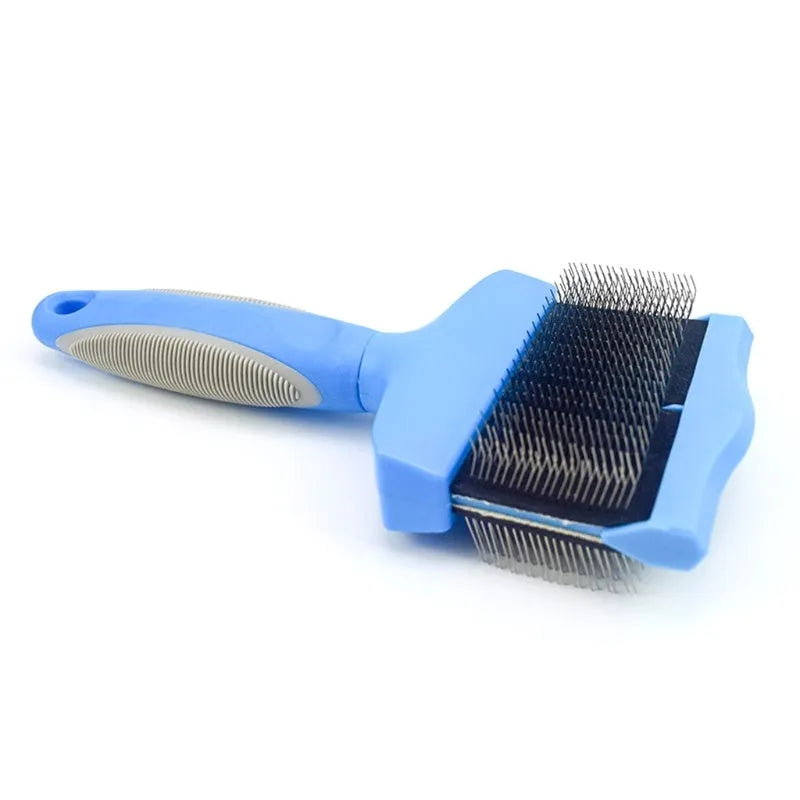 Blue double-sided pet brush with stainless steel pins and ergonomic handle on a white background.
