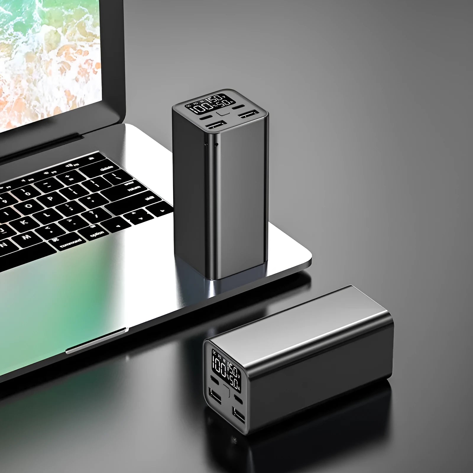 65W high power laptop charging bank with metallic casing showing USB-C port and capacity indicator