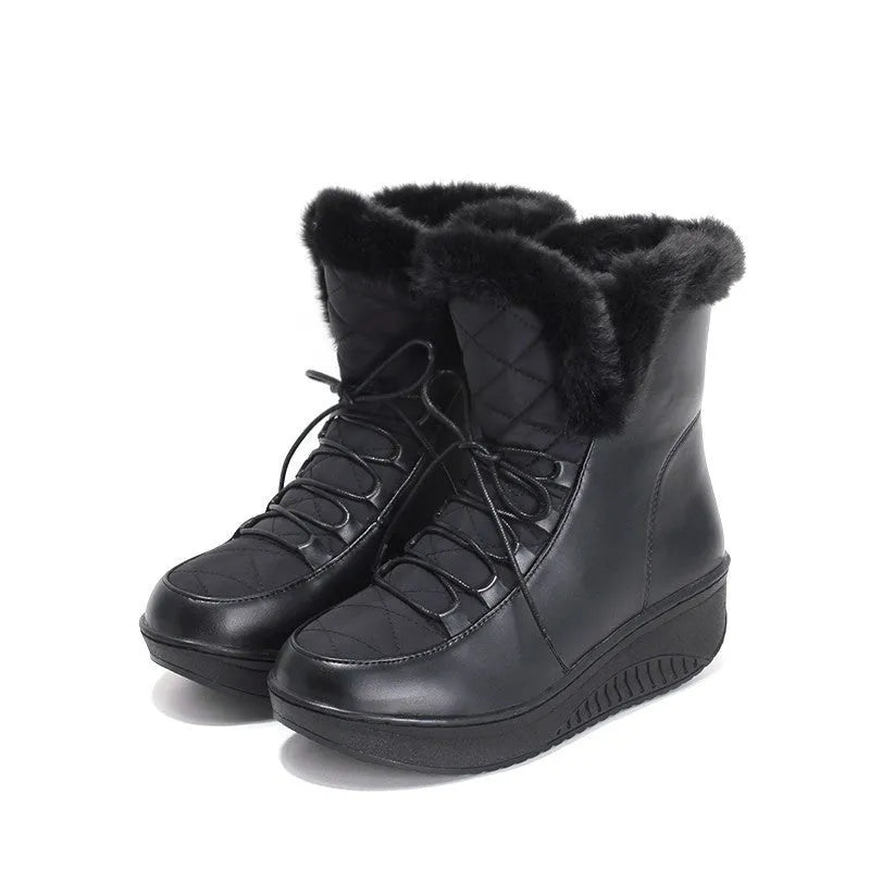 Black women's winter boots with lace-up closure and platform sole