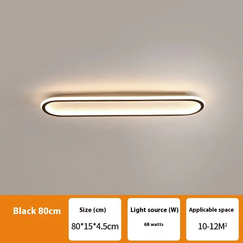 Minimalist black strip ceiling lamp with a linear PVC shade mounted on a white ceiling