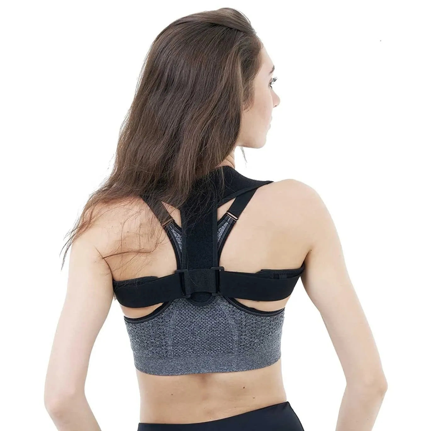 Black adjustable posture correction strap with hook fastening on mannequin torso