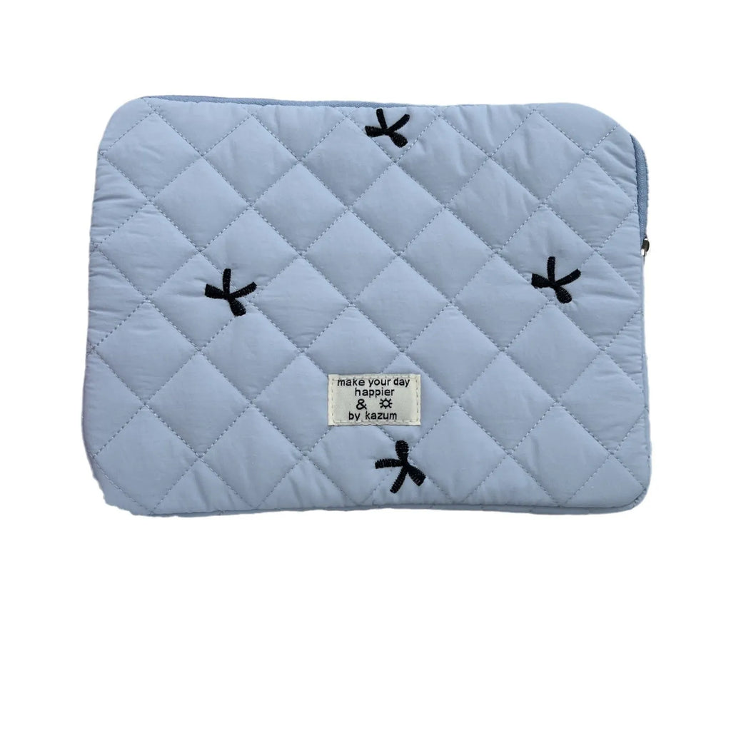 Nylon laptop storage bag with embroidered rhombus bow in light blue, showing size options.