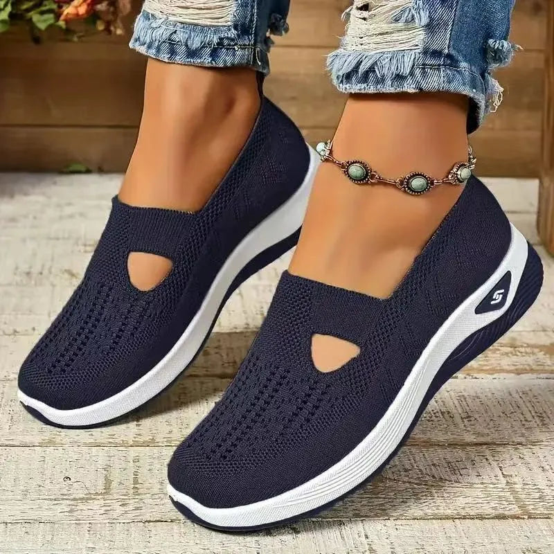 Women's casual mesh flat shoes with a T-bar strap and round toe in multiple colours.