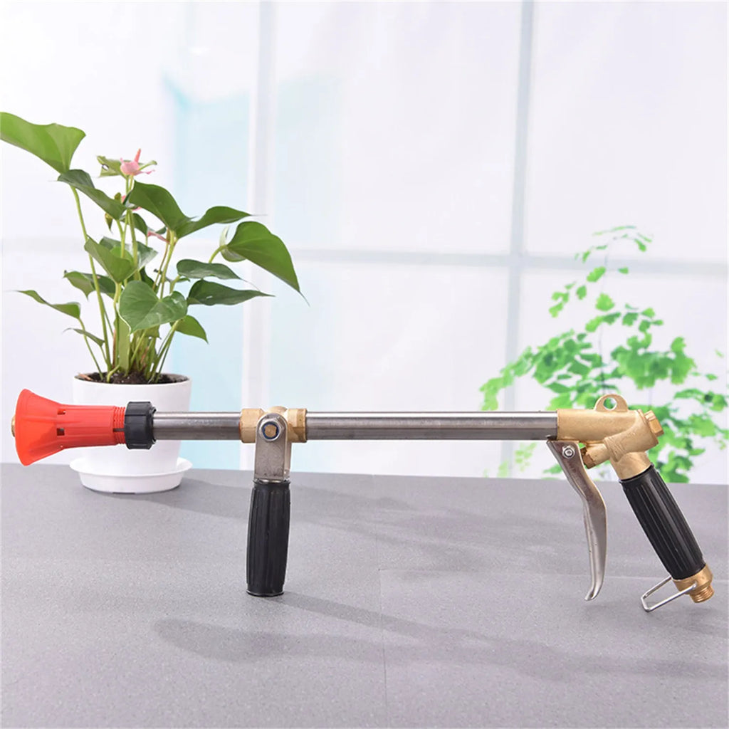 A plastic submachine gun style adjustable high-pressure spray gun for agricultural use.