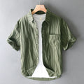 Men's apricot pure cotton loose-fit short sleeve casual shirt on a hanger.
