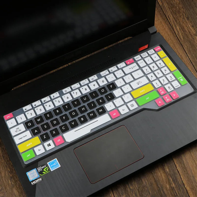 Transparent silicone keyboard protective film for ASUS Flight laptop on a keyboard.