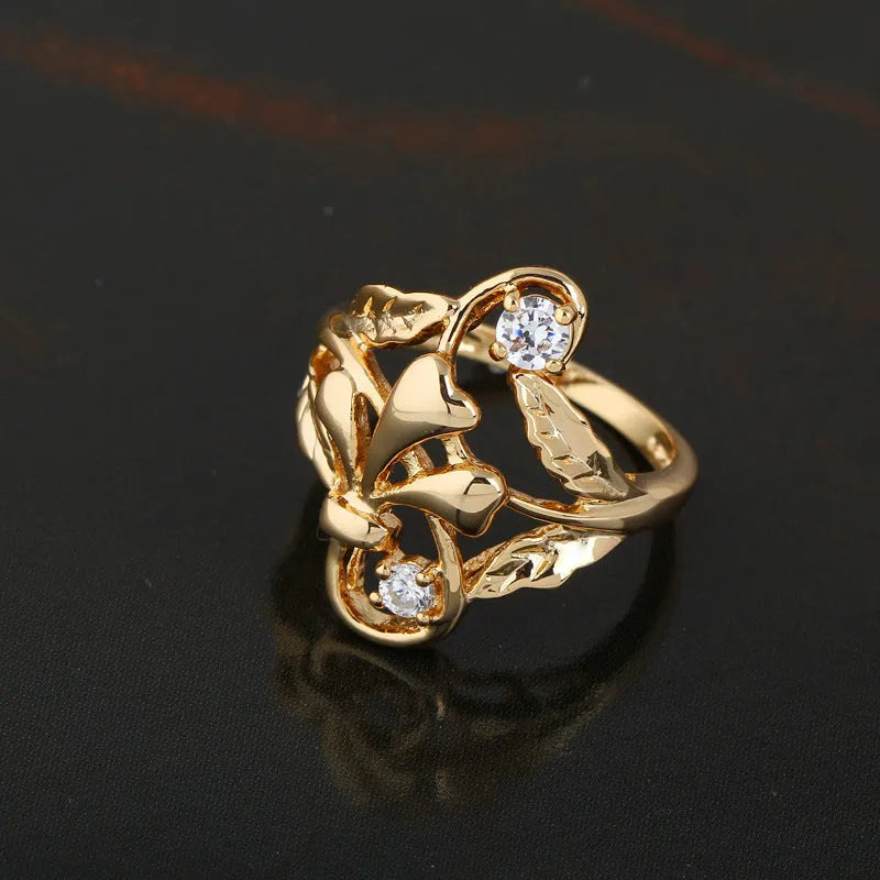 Exaggerated irregular leaf zircon ring on open copper geometric band gold white finish women size 6.5