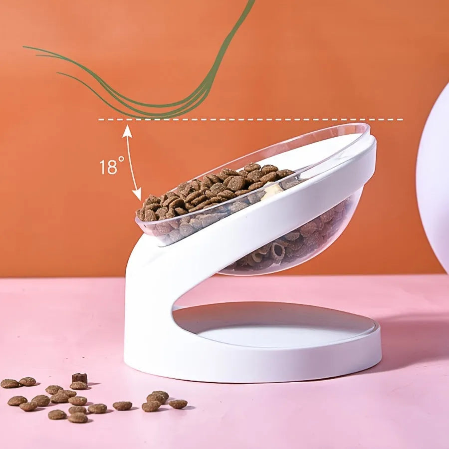 Clear plastic tilted cat food dish on a 7cm tall white plastic elevated base.