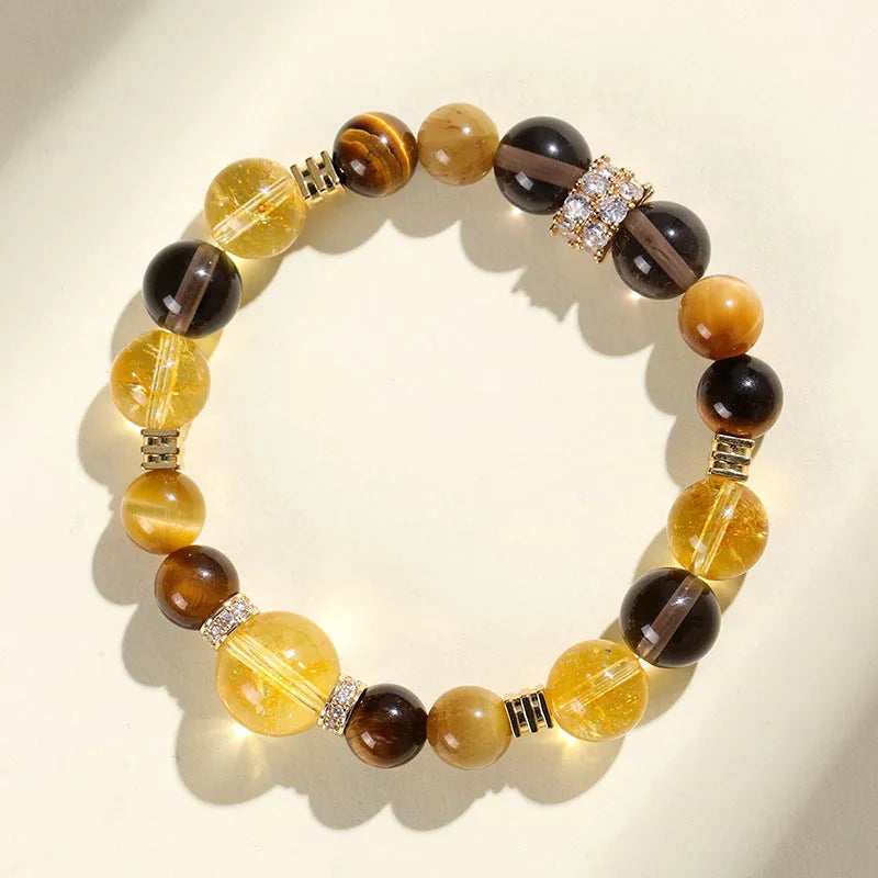 Women's natural yellow tower artificial crystal string beads bracelet with 10mm Jinba beads.