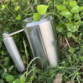Silver stainless steel dumbbell cup overweight weighing 8kg for adjustable strength training equipment.