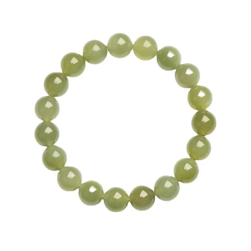 Hetian jade ball bracelet with polished spherical beads on a string, shown in deep and light clear water colour options.