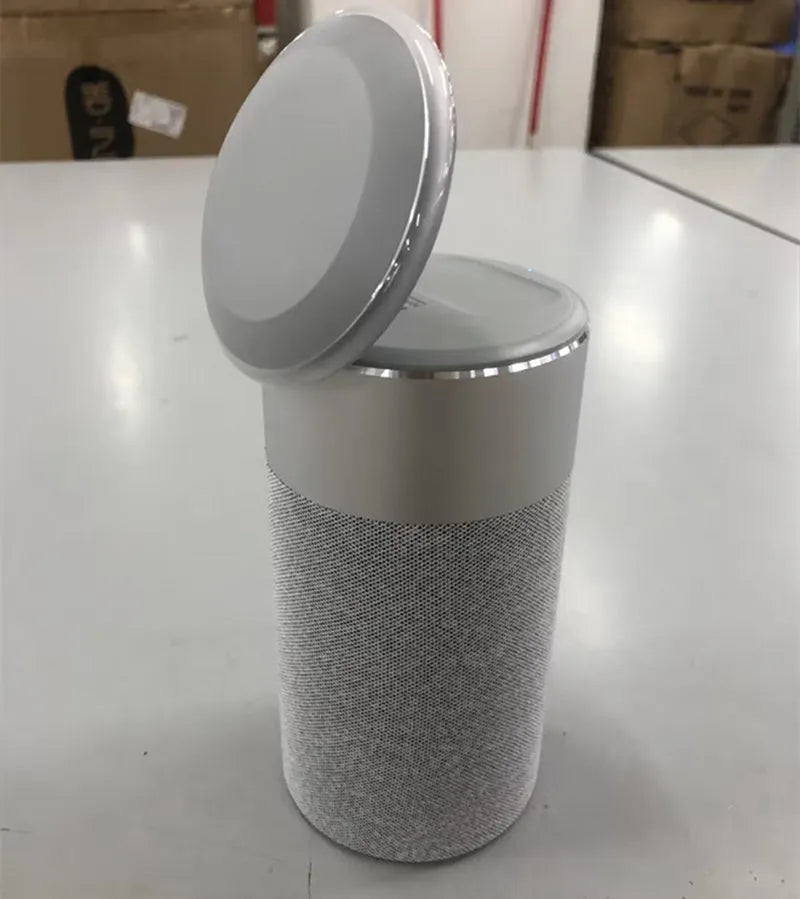 3-in-1 wireless charger Bluetooth speaker touch lamp for iPhone and AirPods in Gold colour on desk