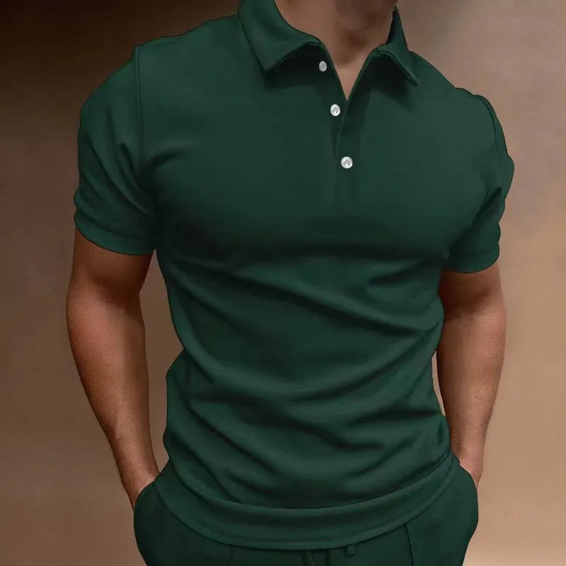 Man wearing a grey loose fit cotton blend short sleeve t-shirt for casual leisure wear.