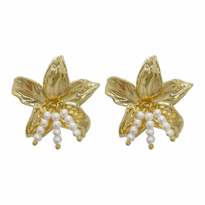 Gold H1795 pearl flower earrings with exaggerated floral design and Seiko-treated metal construction
