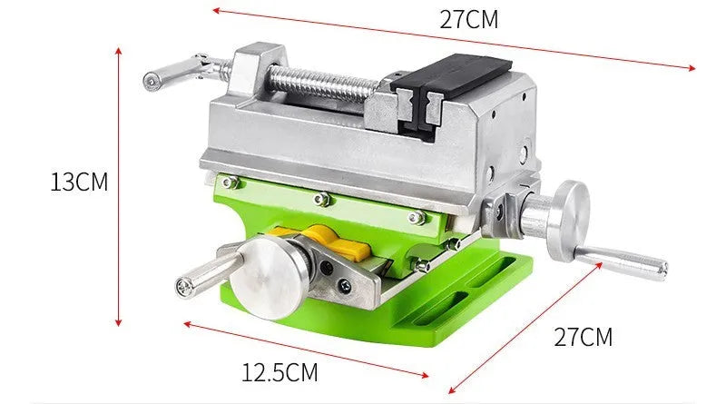 Mini bench drill milling machine with cross bench pliers on workbench