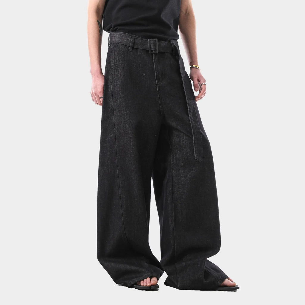 Women's high-waist straight-leg jeans in a black gold wash denim, showing front zip and five-pocket design.