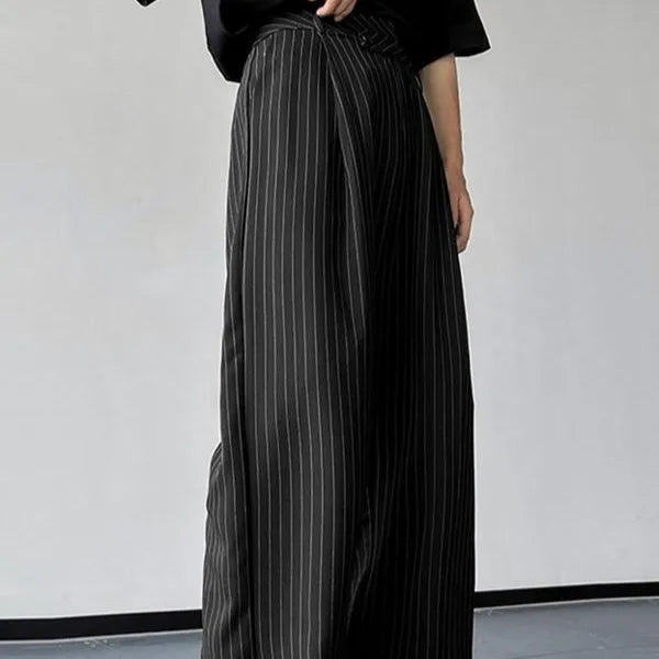 Men's black vertical striped pleated casual trousers showing front view
