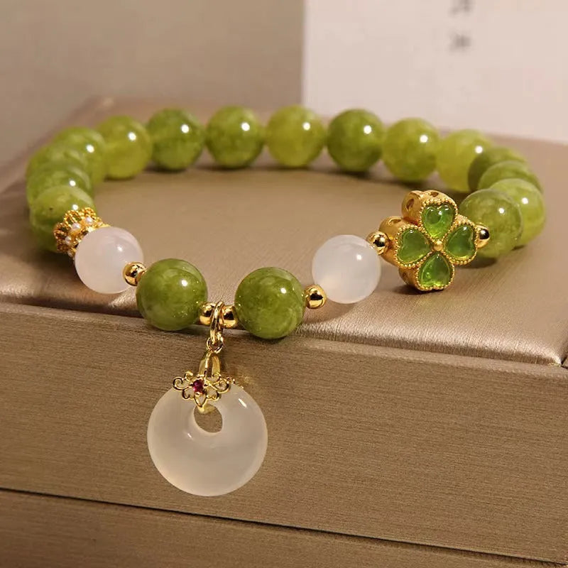 Natural stone green tourmaline women's bracelet with four-leaf clover charm and safety buckle closure