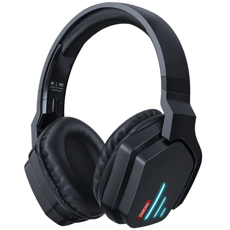 Luminous black wireless gaming headphones with head-mounted design showing ear cups and included 3.5mm cable