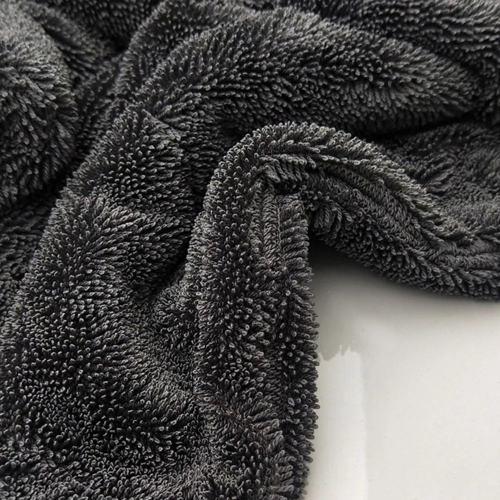 Grey microfiber car drying towel laid flat showing 40x40cm size.