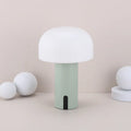 Decorative LED mushroom night light in white with warm white glow, touch switch, and USB port